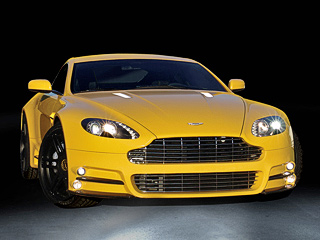 Aston martin v8 vantage. Кто ещё может сделать жёлтый Aston Martin с&nbsp;вычурным бампером и&nbsp;кучей светящихся лампочек? Конечно&nbsp;же, Mansory!