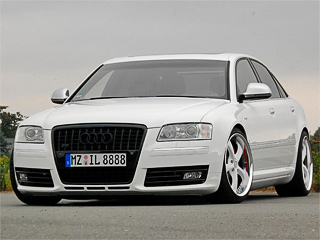 Audi s8. Доработки во&nbsp;внешности минимальны: решётка радиатора, окрашенная в&nbsp;чёрный цвет, и&nbsp;белые диски с&nbsp;шинами размерностью 255/35&nbsp;R19&nbsp;спереди и&nbsp;305/25&nbsp;R20&nbsp;сзади.