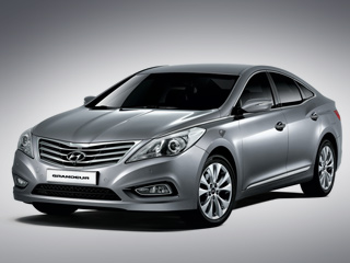 Hyundai grandeur. Переднеприводной четырёхдверке Grandeur 2011 модельного года светит шестиступенчатый «автомат» разработки Hyundai.