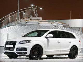 Audi q7. Литые диски симпатичны, но&nbsp;почему на&nbsp;колпачках в&nbsp;центре изображён логотип Porsche? Да, и&nbsp;неужели немецкие тюнеры не&nbsp;могли подобрать более солидные шины, а&nbsp;не&nbsp;Hankook Icebear W300 размерностью 265/35 R22?