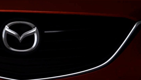 Mazda 6. Автомобиль на тизерах виден только анфас. По слухам, первым дебютирует универсал, позже будет показан седан, а хэтчбек японцы представят самым последним.