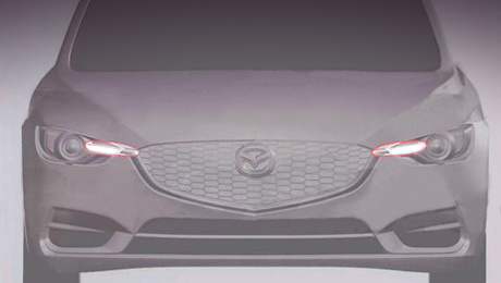 Mazda 3. Судя по этим изображениям, анфас новинка будет выглядеть очень агрессивно.
