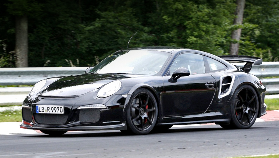 Porsche 911,Porsche 911 gt2. Новое купе Porsche 911 GT2, скорее всего, официально будет представлено весной 2014 года в Женеве. Но уже сейчас на него можно взглянуть без камуфляжа.