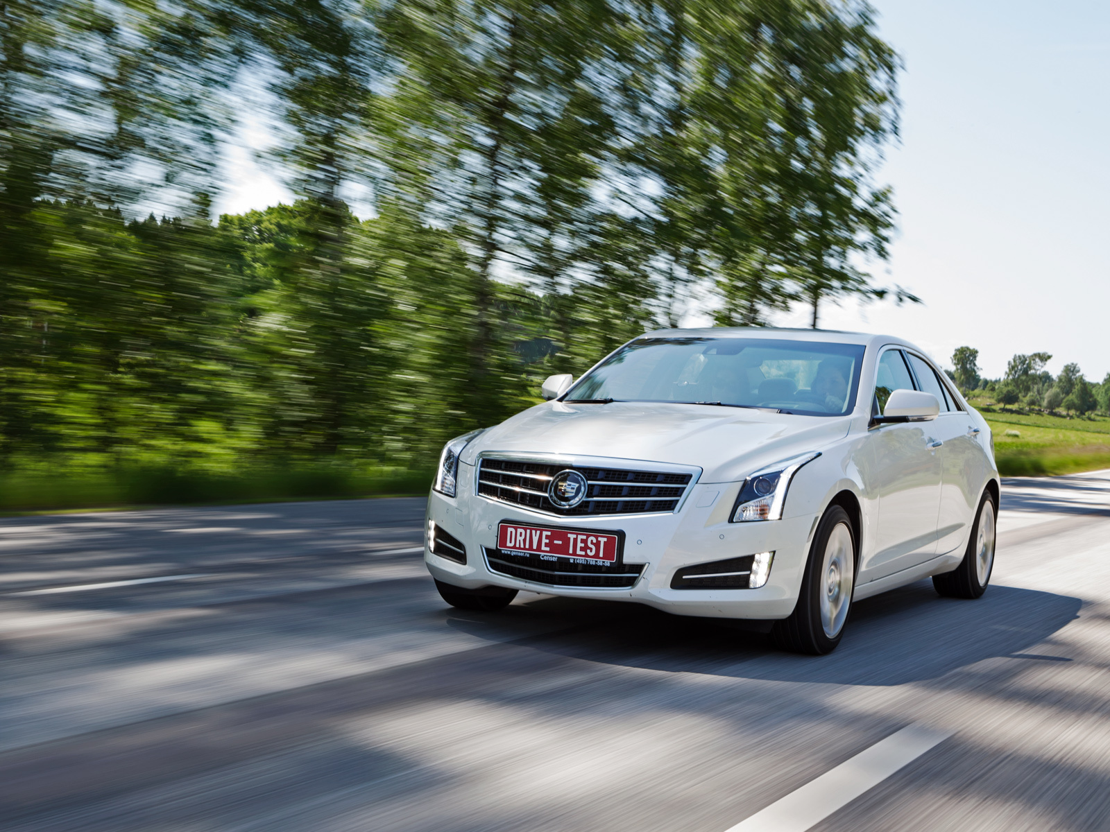 Дефилируем по Швеции на седане Cadillac ATS — ДРАЙВ