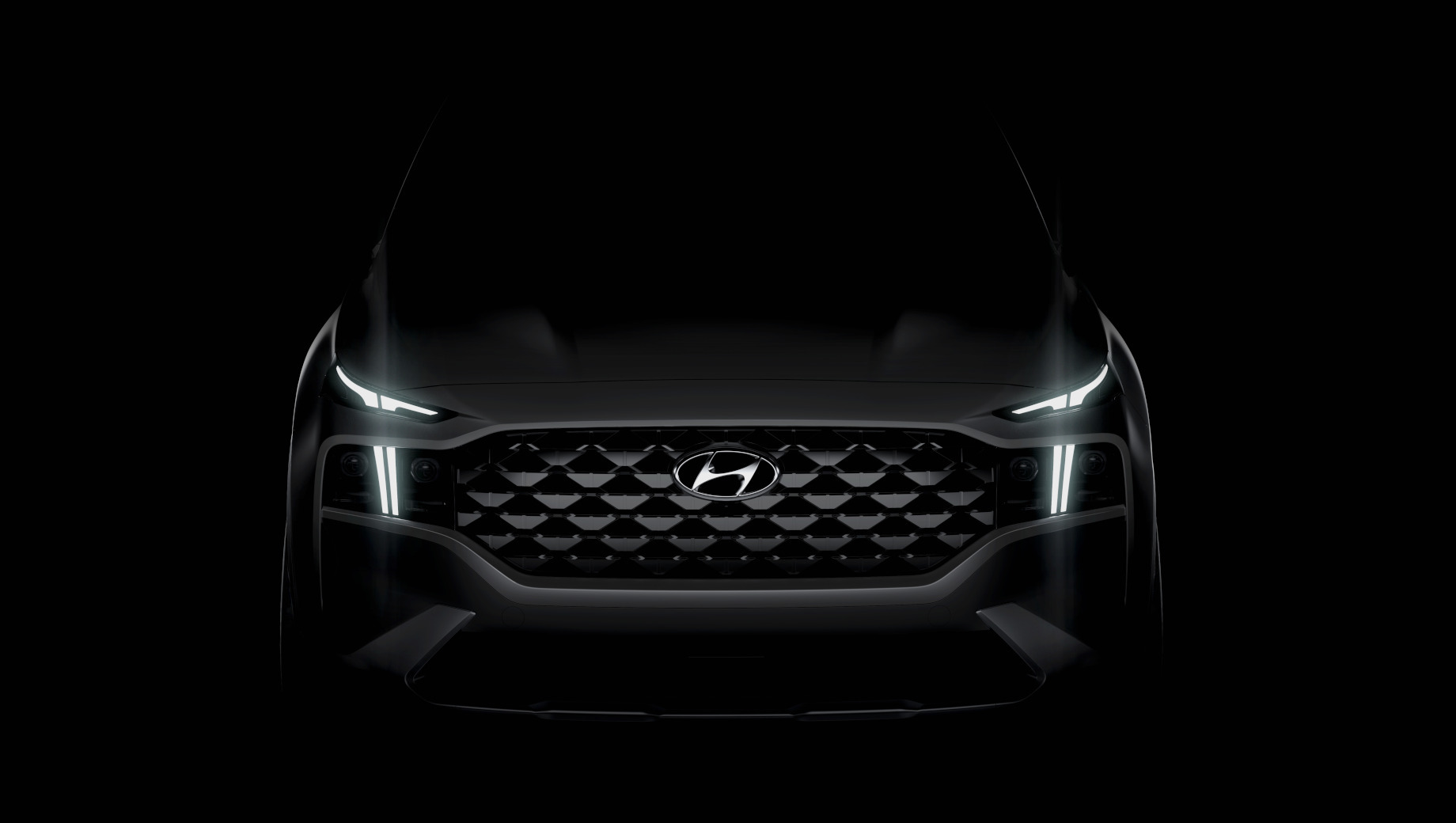 Hyundai santa fe. Hyundai хочет, чтобы мы увидели существенно расширенную решётку со «стереоскопическим геометрическим рисунком» и Т-образные ходовые огни, которые «намекают на технологические усовершенствования» и «отражают новую интегрированную архитектуру».