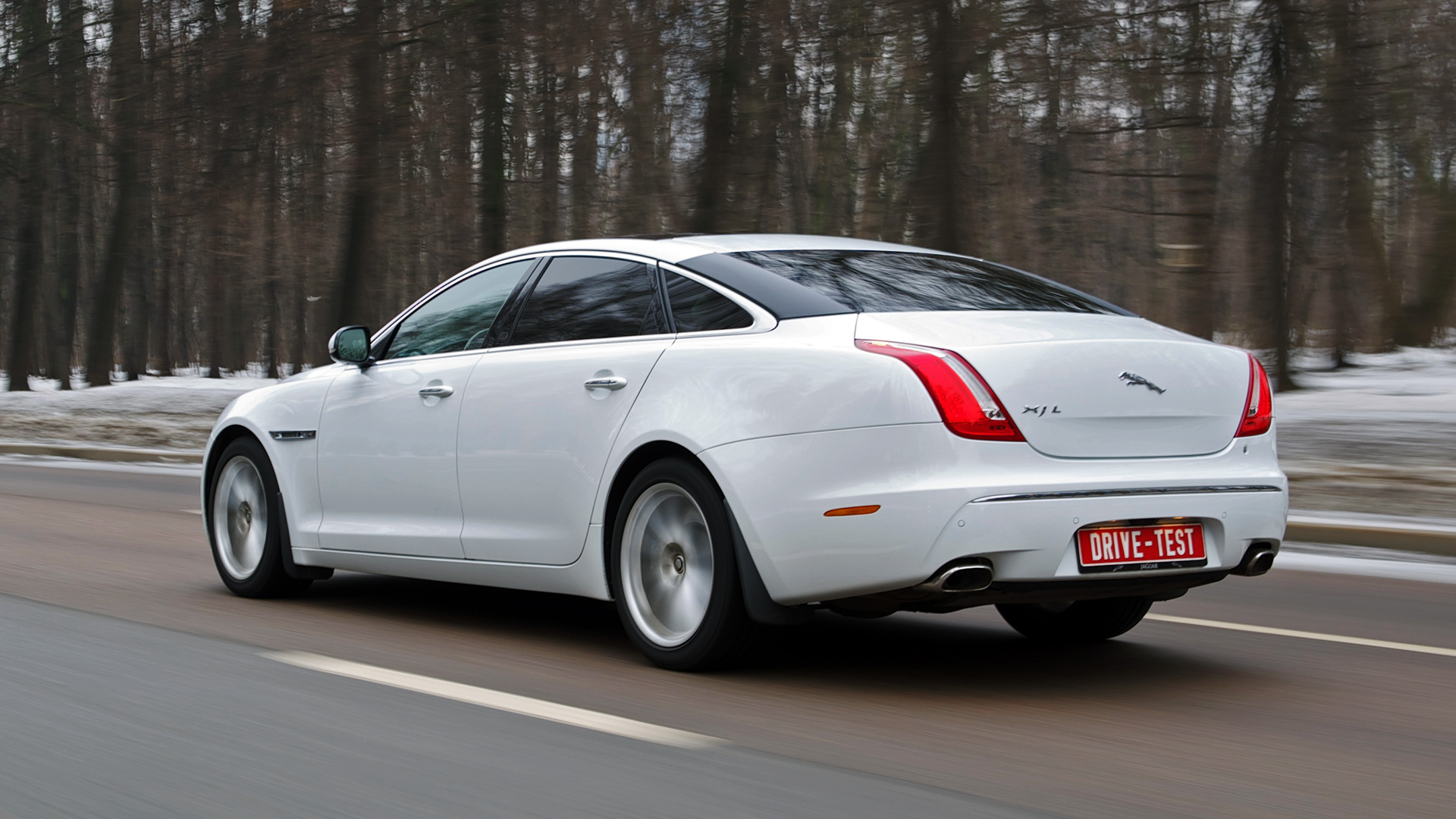 Пробуем длиннобазный Jaguar XJ в чёрном, белом и ещё кое-что — ДРАЙВ